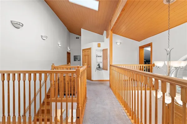a view of a porch with wooden floor