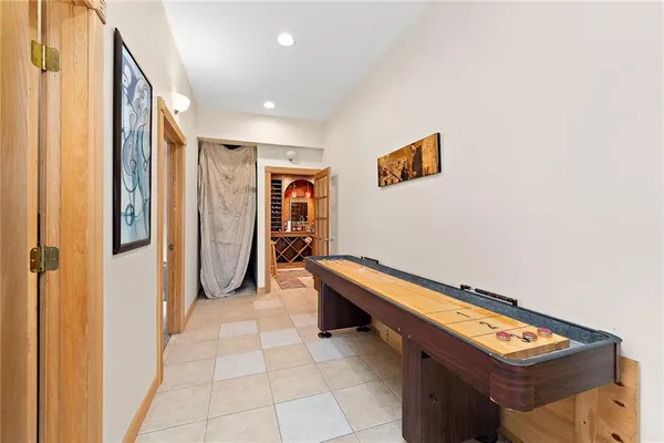 a view of room with window and furniture