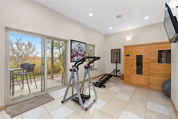 a view of a room with gym equipment