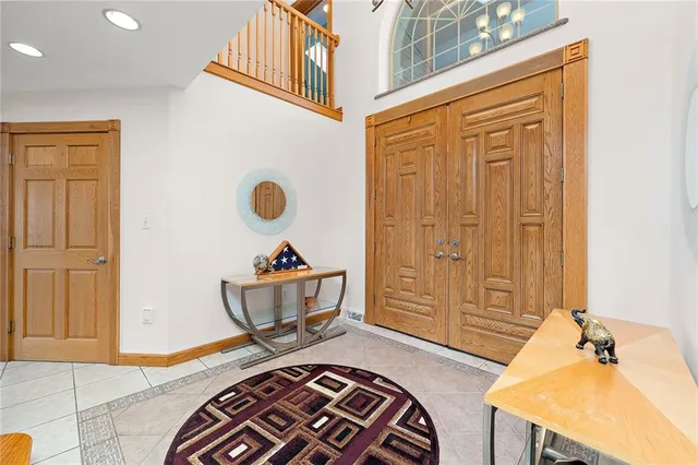 a bedroom with a bed and a table