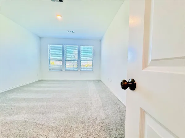 a spacious bathroom with a double vanity sink mirror and