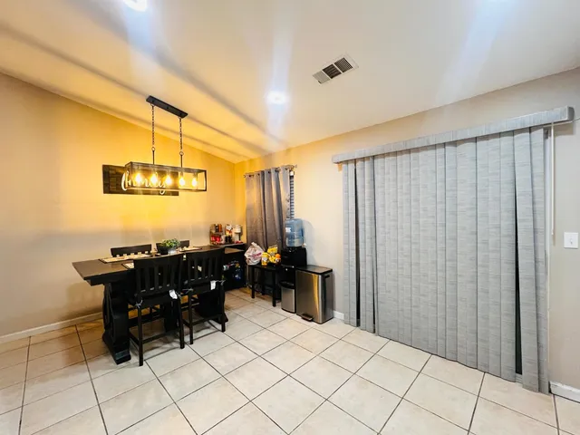 a bed room with a bed and furniture