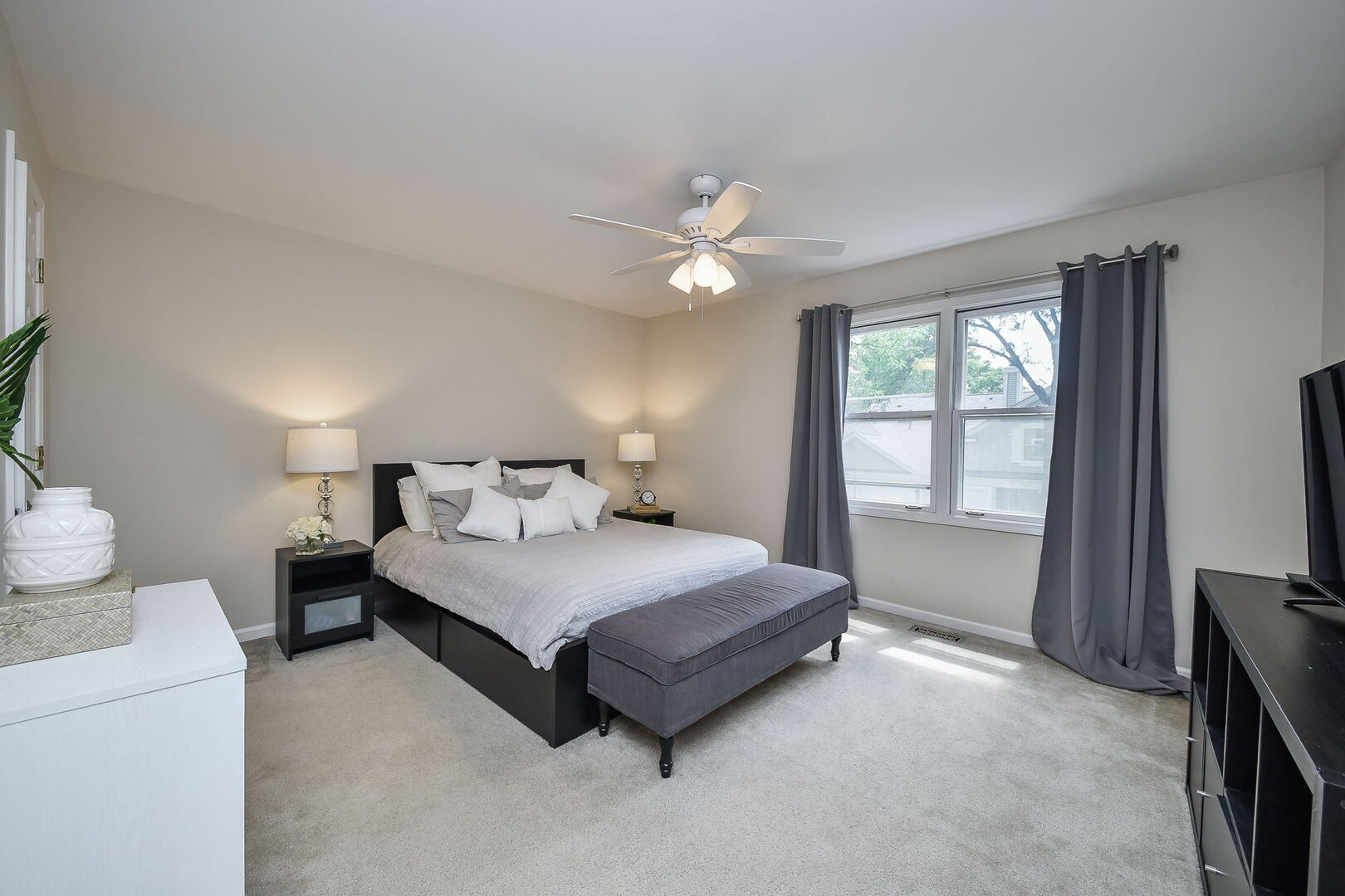 1941 Gresham Circle Wheaton, IL 60189 - Photo 7 of 13 a spacious bedroom with a bed and a window