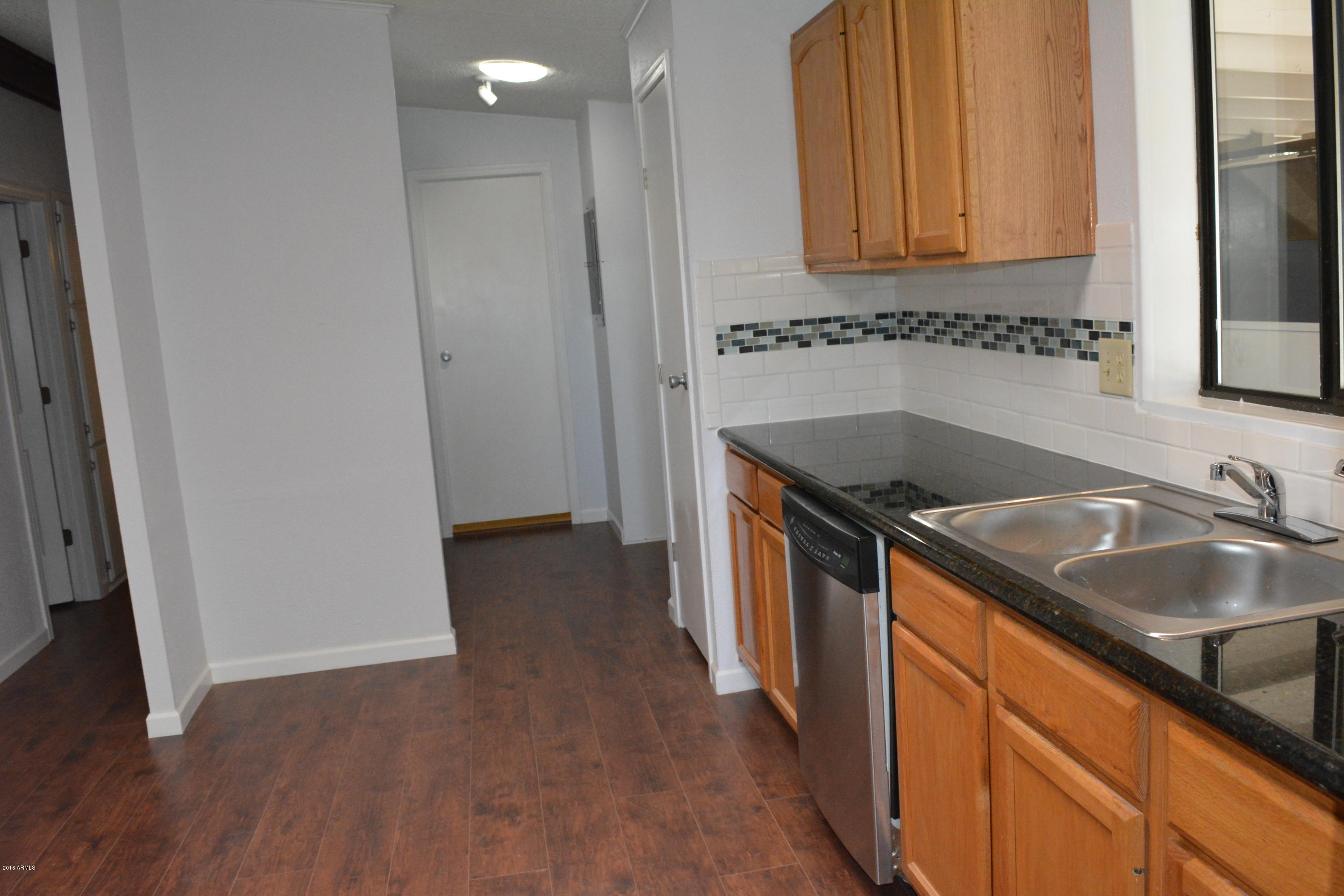 108 North Lakeshore Road Payson, AZ 85541 - Photo 6 of 17 Kitchen looking towards laundry room