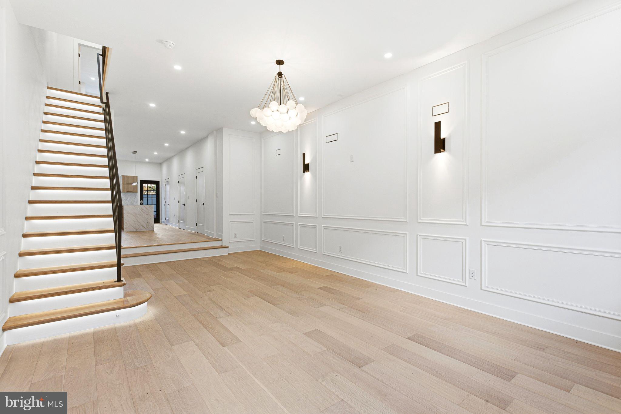 1419 Wharton Street Philadelphia, PA 19146 - Photo 1 of 39 an empty room with kitchen and window