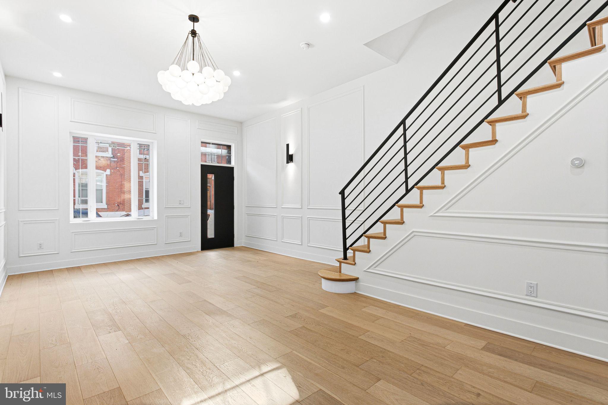 1419 Wharton Street Philadelphia, PA 19146 - Photo 3 of 39 a view of entryway and hall with wooden floor