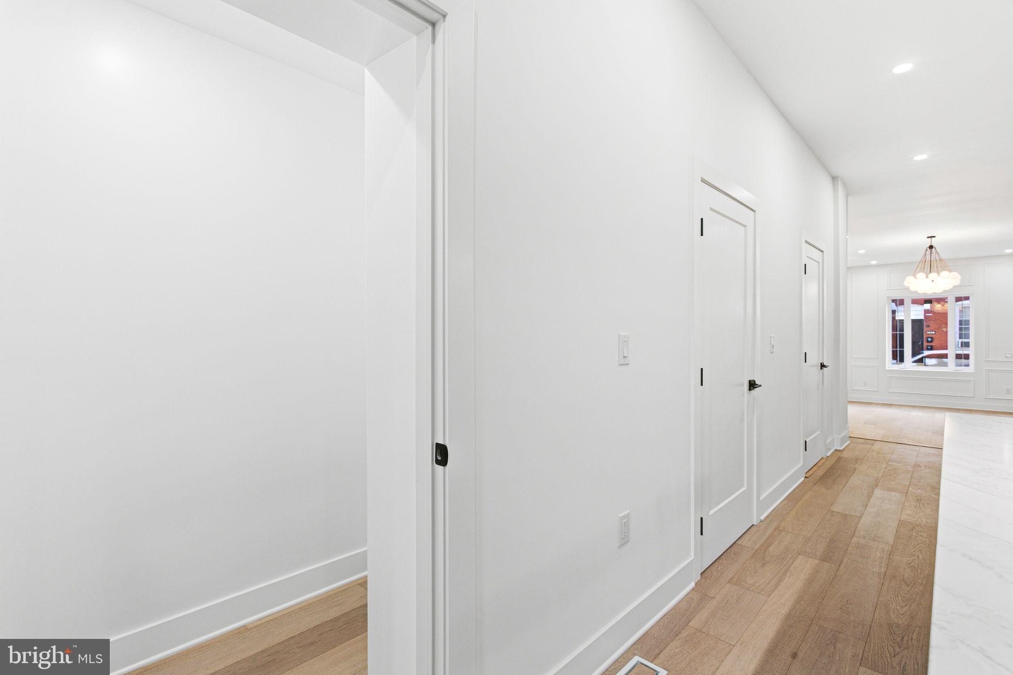 1419 Wharton Street Philadelphia, PA 19146 - Photo 10 of 39 a view of a hallway with wooden floor