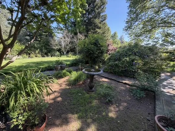 a view of a porch with furniture and outside view