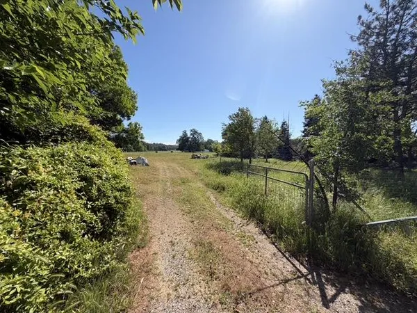a view of a lake with a outdoor space