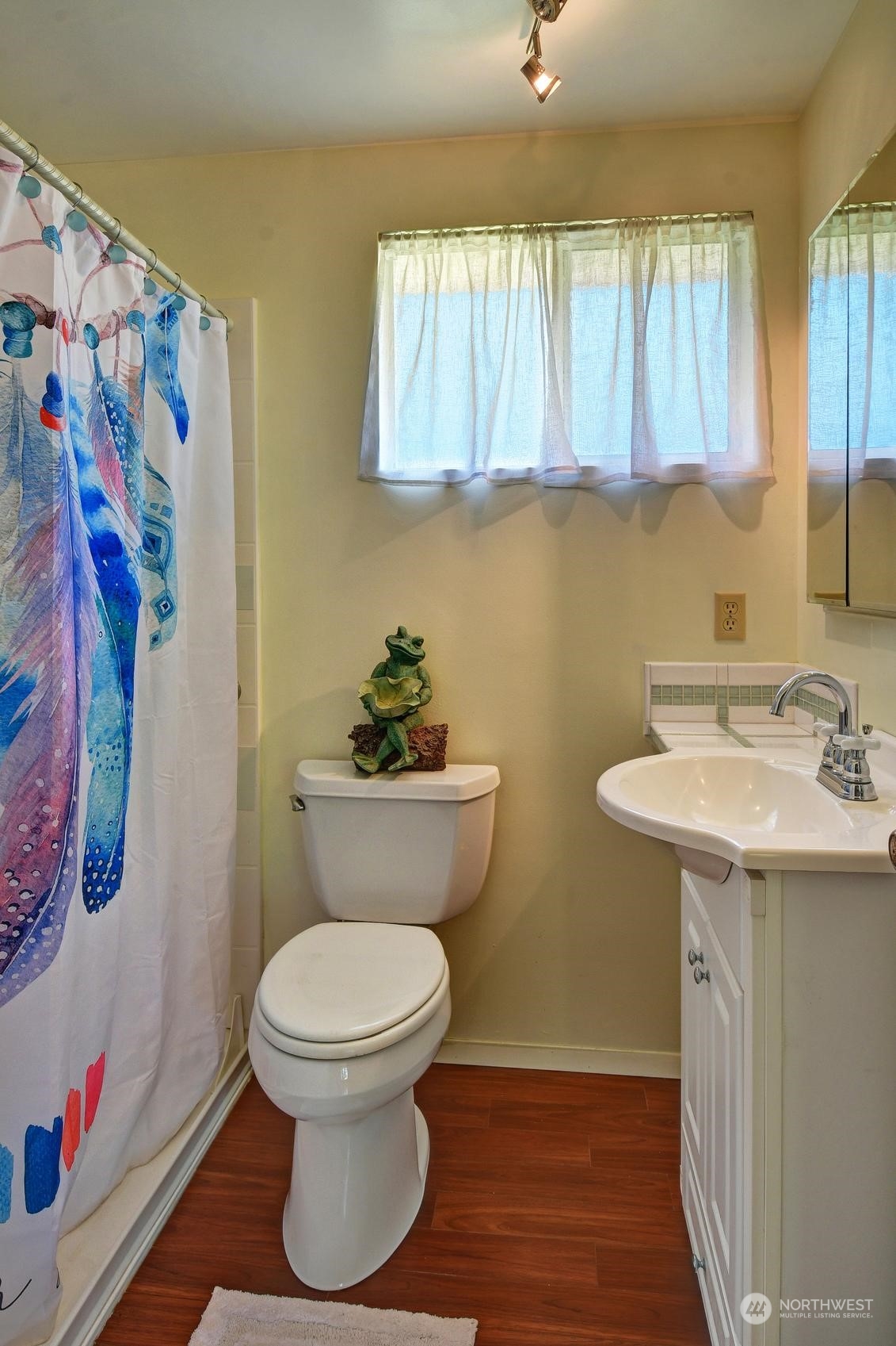 21 North Machias Road Snohomish, WA 98290 - Photo 11 of 21 a bathroom with a toilet a sink and a window