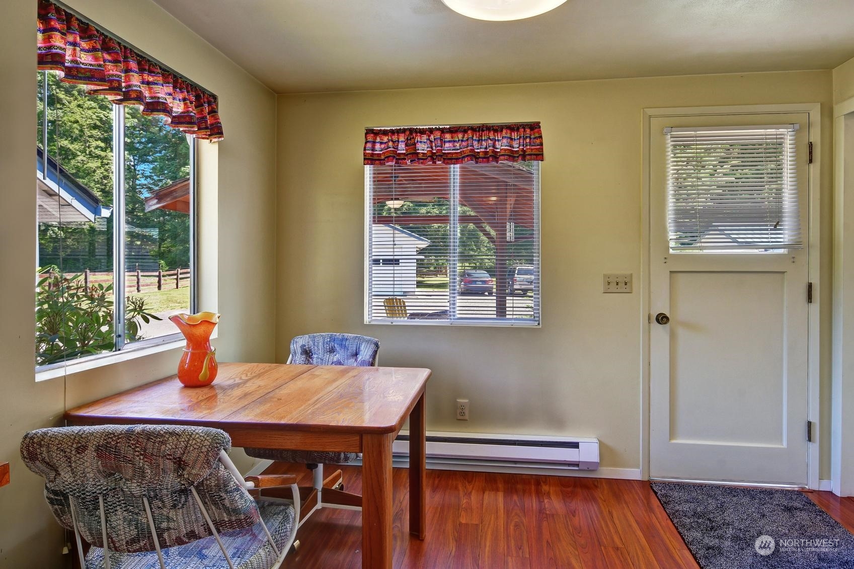 21 North Machias Road Snohomish, WA 98290 - Photo 5 of 21 a view of a dining room with furniture and wooden floor