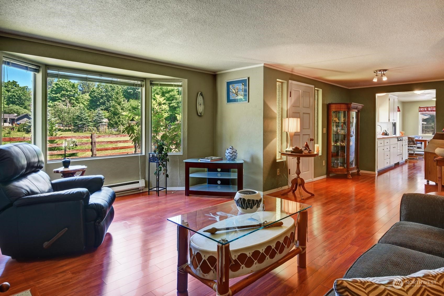 21 North Machias Road Snohomish, WA 98290 - Photo 8 of 21 a living room with furniture and a floor to ceiling window
