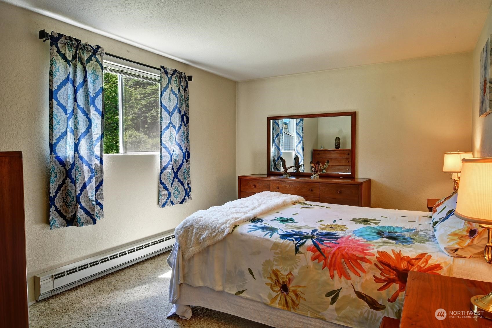 21 North Machias Road Snohomish, WA 98290 - Photo 10 of 21 a bedroom with a large bed and a window