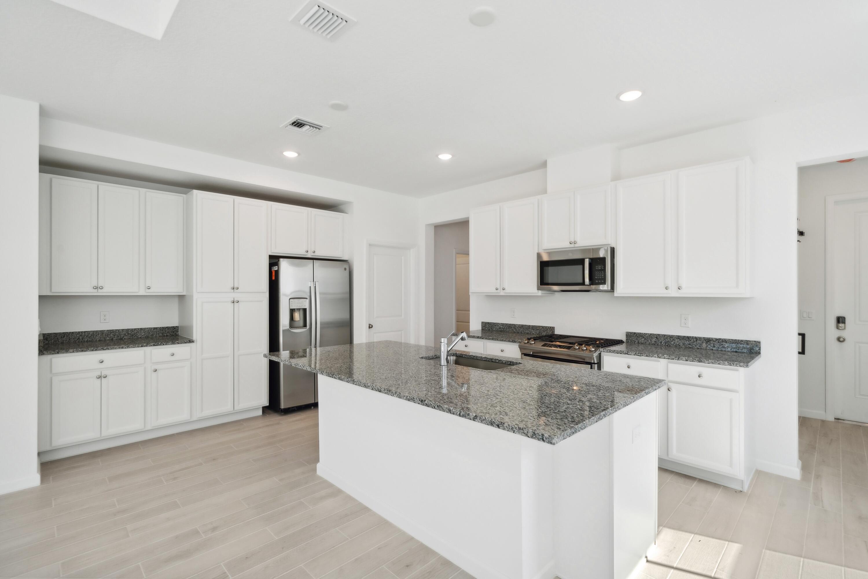 10115 Dreamweaver Road, Unit 49 Port St. Lucie, FL 34987 - Photo 6 of 36 Kitchen