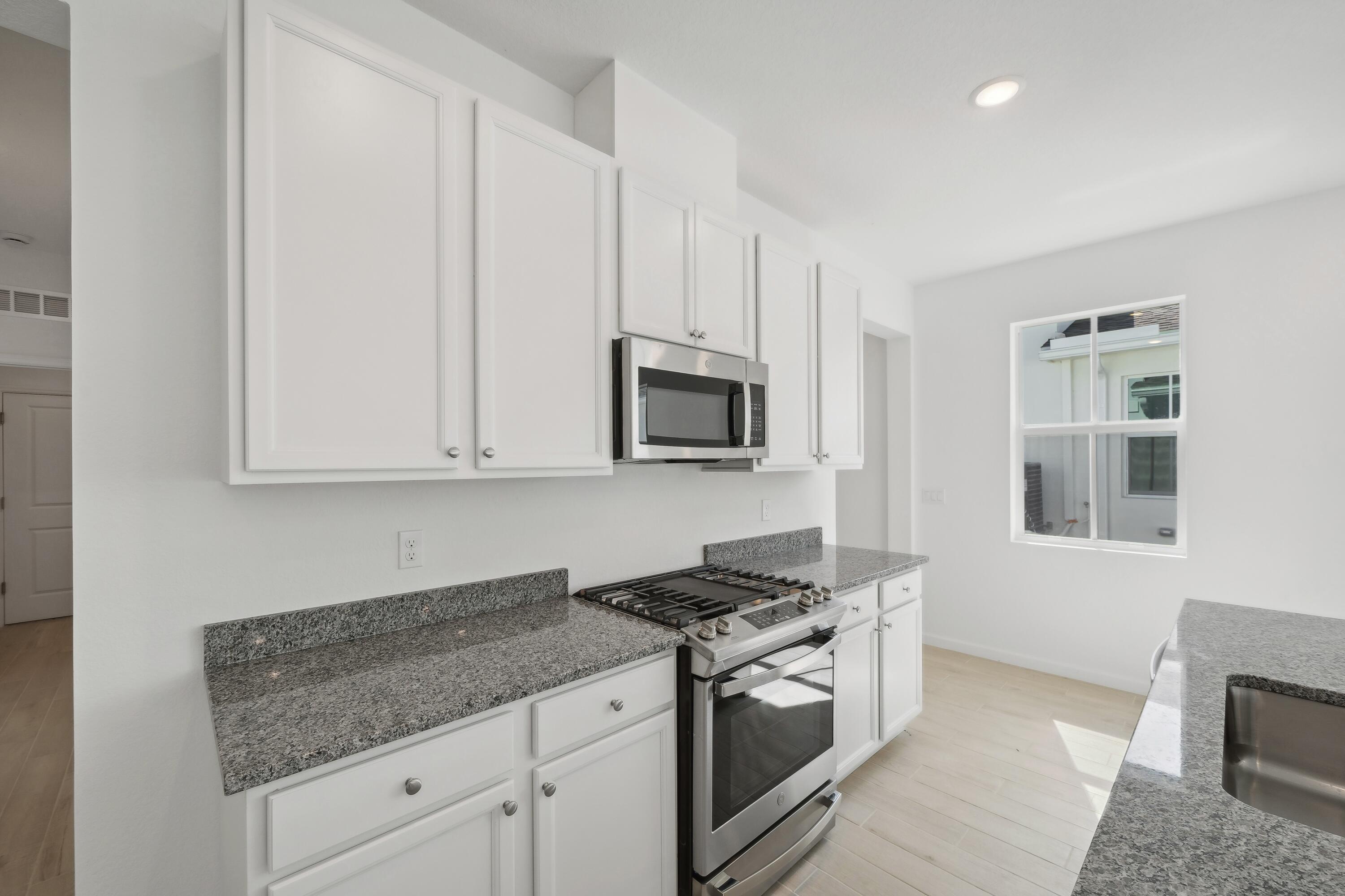 10115 Dreamweaver Road, Unit 49 Port St. Lucie, FL 34987 - Photo 8 of 36 Kitchen