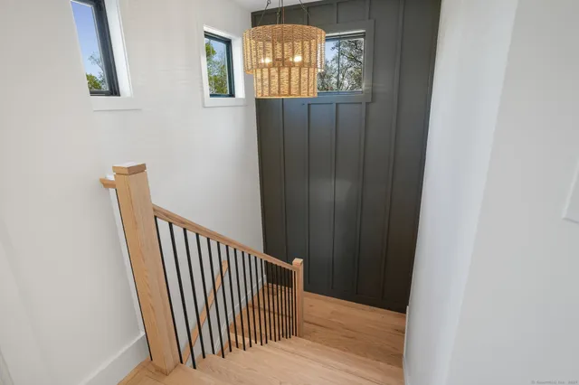 a bathroom with a glass door shower