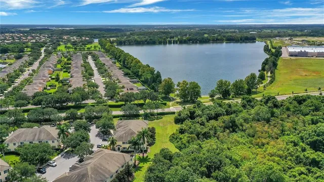 a view of a lake with a city view