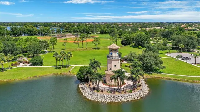 a view of a lake with a big yard