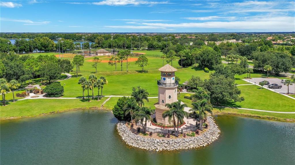 280 Cape Harbour Loop, Unit 101 Bradenton, FL 34212 - Photo 30 of 35 a view of a lake with a big yard