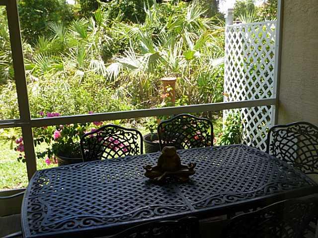 150 Southwest Walking Path Stuart, FL 34997 - Photo 13 of 25 a view of balcony with wooden floor