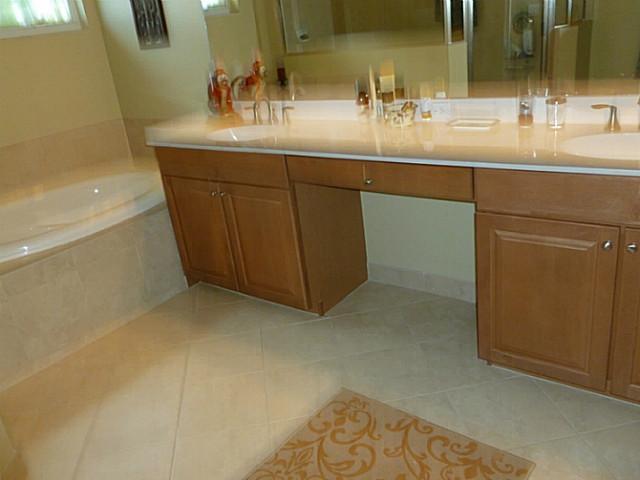 150 Southwest Walking Path Stuart, FL 34997 - Photo 18 of 25 a bathroom with a sink and a mirror