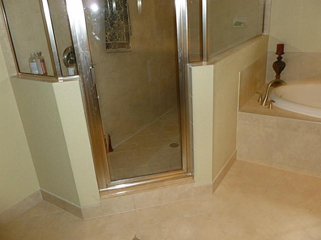 150 Southwest Walking Path Stuart, FL 34997 - Photo 19 of 25 a bathroom with a shower