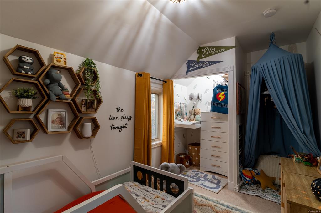 374 Hill Road Jeffersonville, NY 12748 - Photo 17 of 36 Bedroom with carpet floors and vaulted ceiling