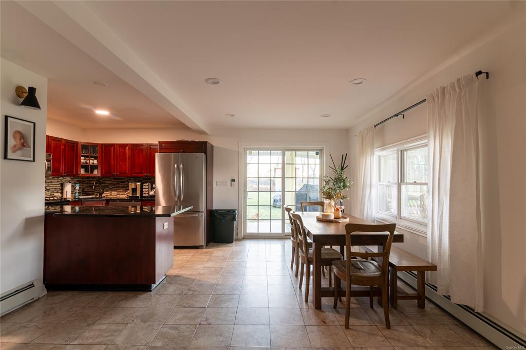 374 Hill Road Jeffersonville, NY 12748 - Photo 33 of 36 Dining area featuring a baseboard radiator