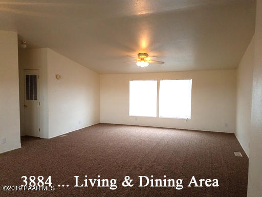 3880-3884 North Reed Road Chino Valley, AZ 86323 - Photo 8 of 30 a view of an empty room and a window