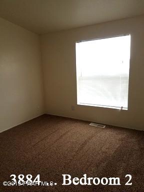 3880-3884 North Reed Road Chino Valley, AZ 86323 - Photo 10 of 30 a view of an empty room and window