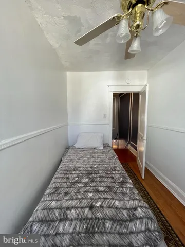 a view of a hallway with a chandelier