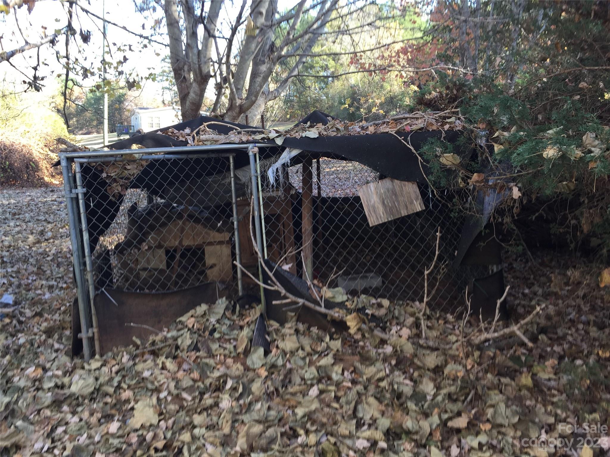 171 Charlie Randall Road Lawndale, NC 28090 - Photo 25 of 28 a view of a house with a tree beside it