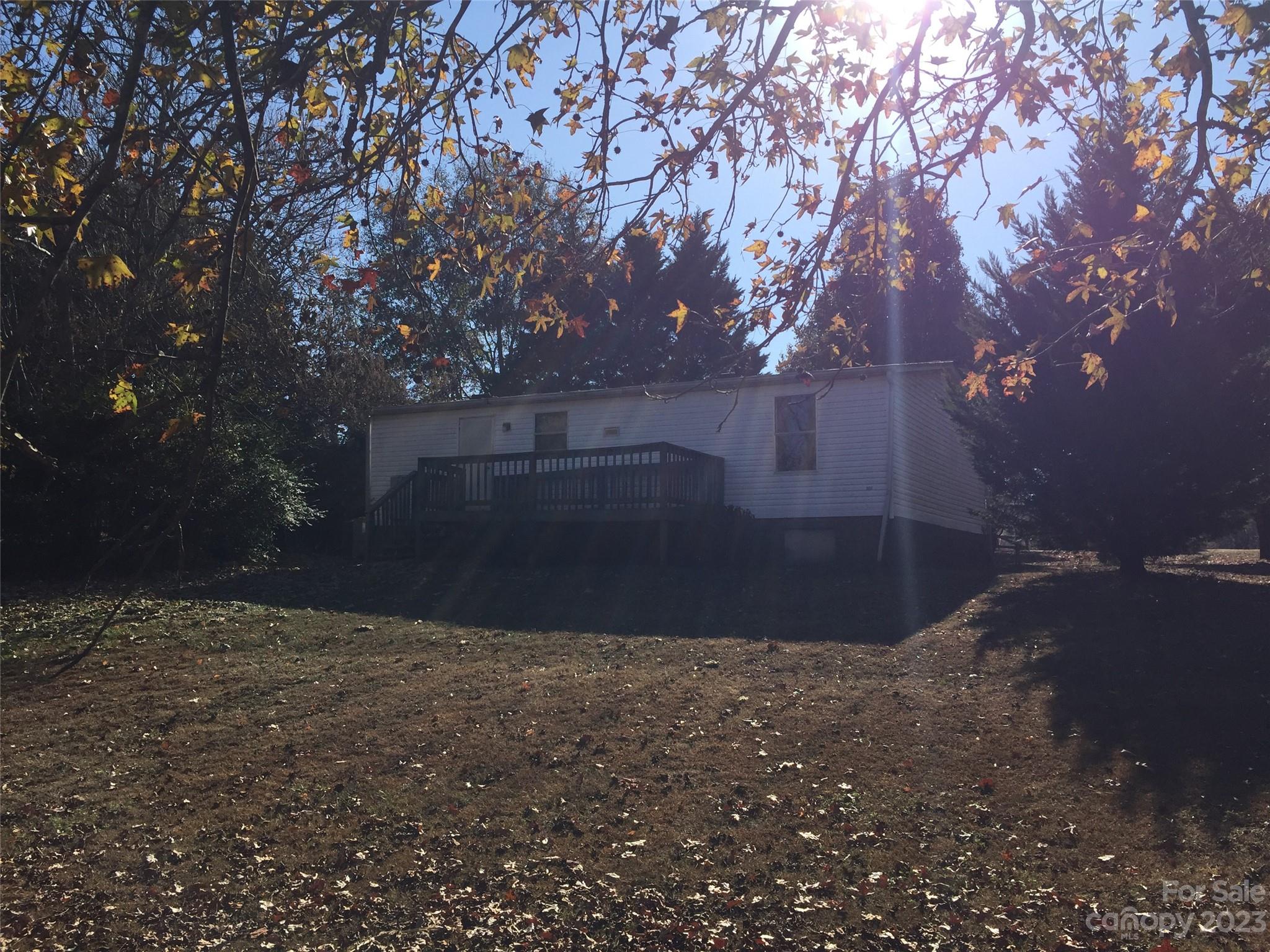 171 Charlie Randall Road Lawndale, NC 28090 - Photo 26 of 28 a view of backyard and tree