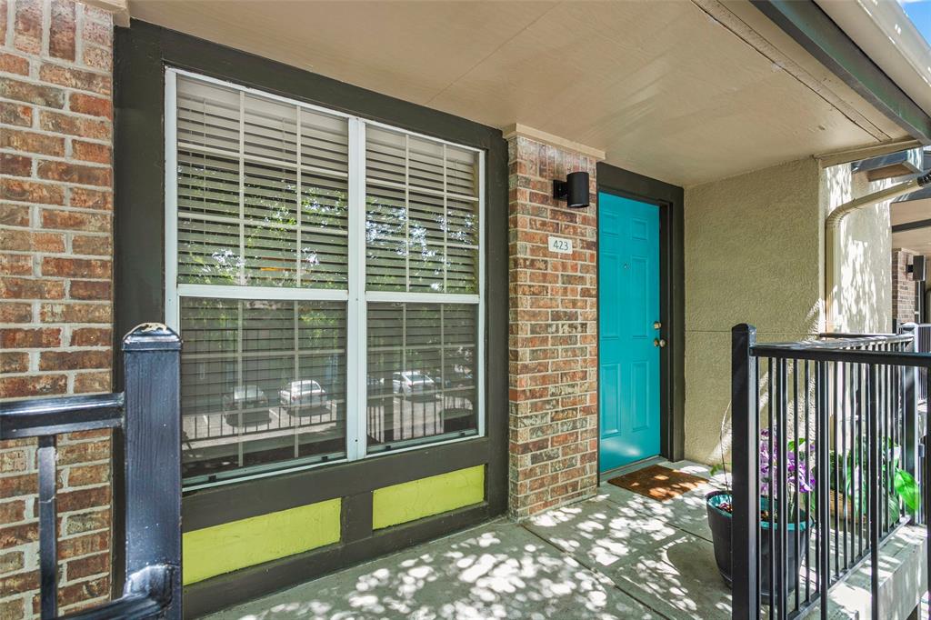 7685 Northcross Drive, Unit 423 Austin, TX 78757 - Photo 16 of 20 a view of a porch with a floor to ceiling window