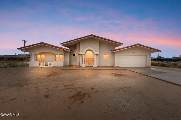 a house view with a garden space