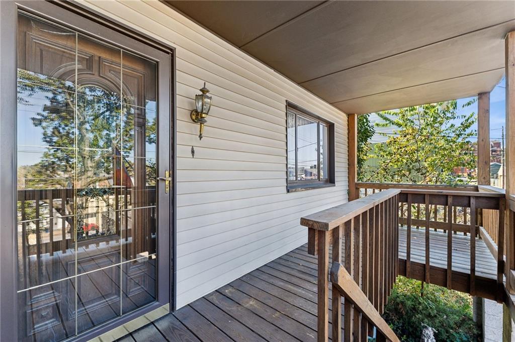 28 Gregory Street Pittsburgh, PA 15203 - Photo 3 of 44 a view of a balcony with wooden floor