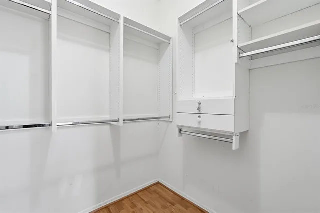 a view of an empty walk in closet