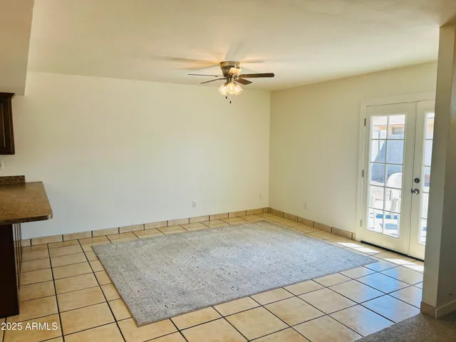a view of empty room with fireplace