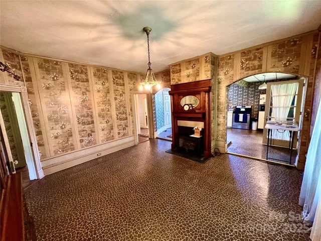 a kitchen with sink refrigerator and window