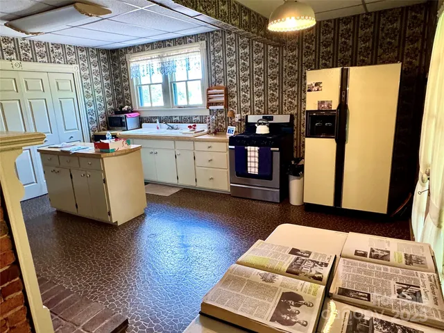 a bathroom with a bathtub and sink