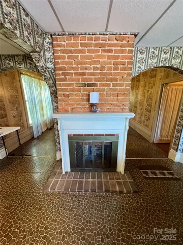 a bathroom with a bathtub sink mirror and toilet