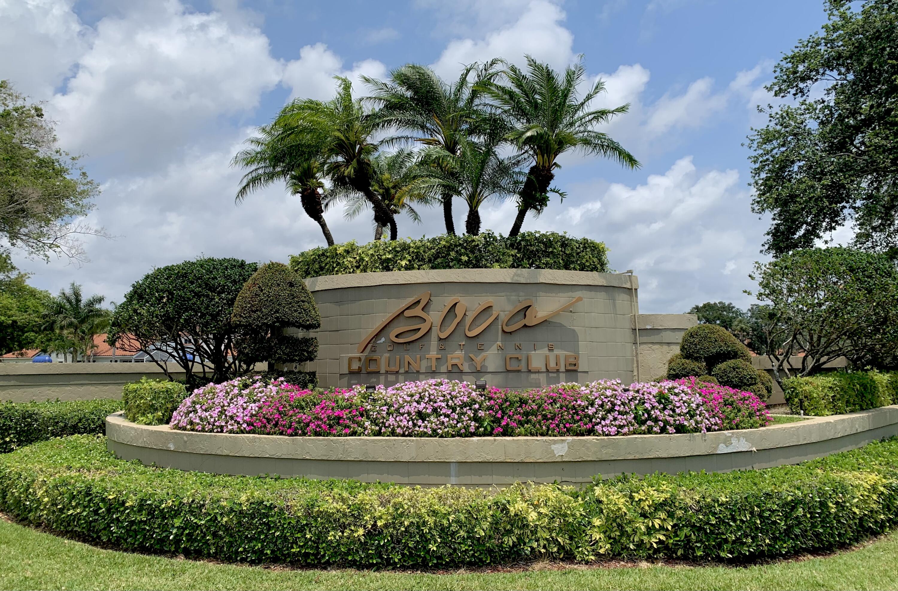 17372 Boca Club Boulevard, Unit 405 Boca Raton, FL 33487 - Photo 1 of 74 a view of a flower in a garden