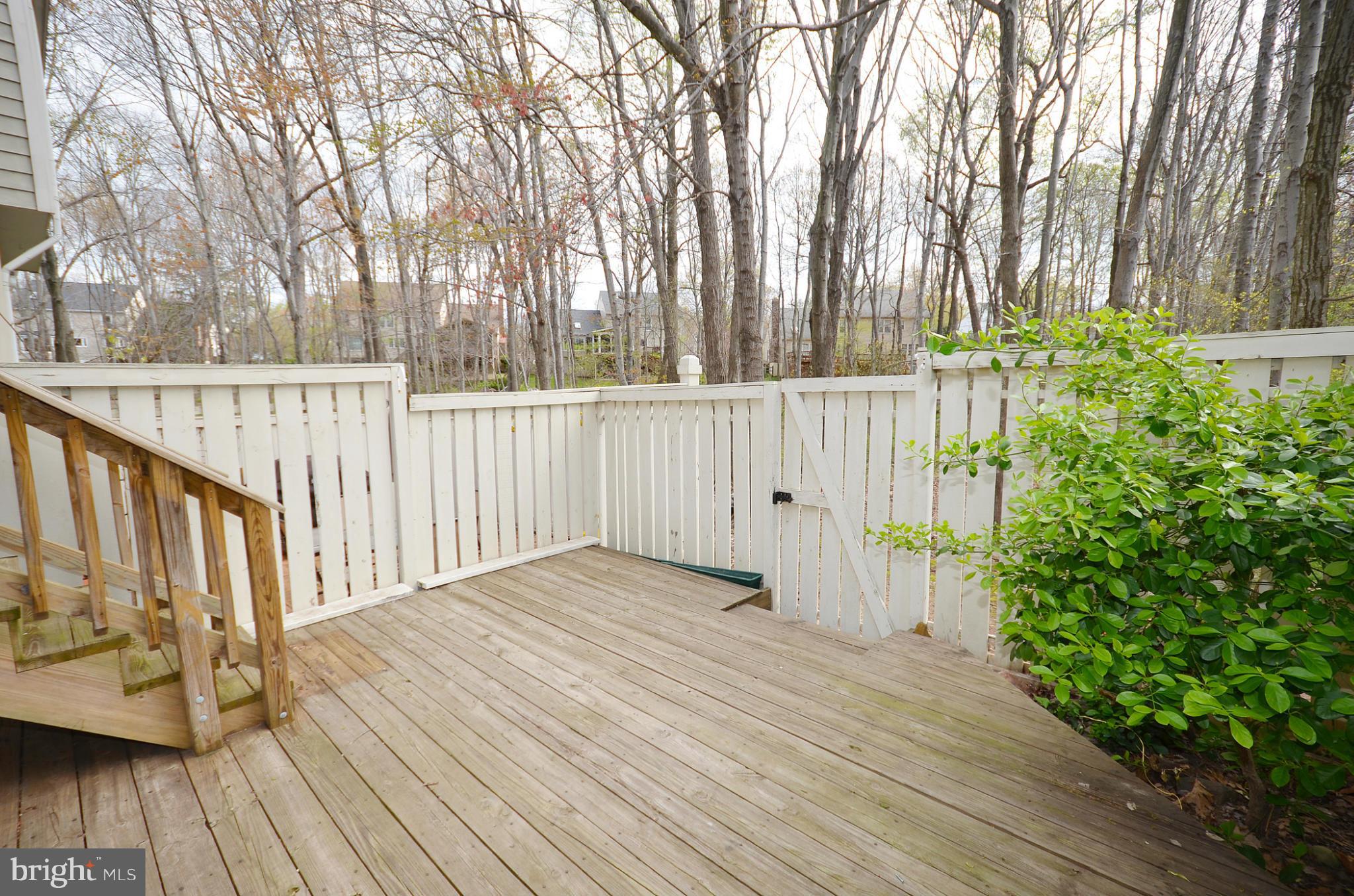 1617 Fieldthorn Drive Reston, VA 20194 - Photo 15 of 30 Fenced yard with deck