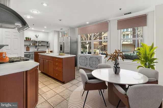 a bedroom with furniture and wooden floor