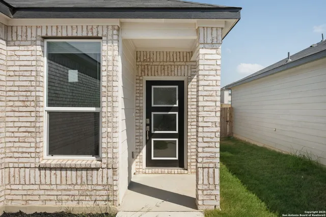 a view of a house with a large window