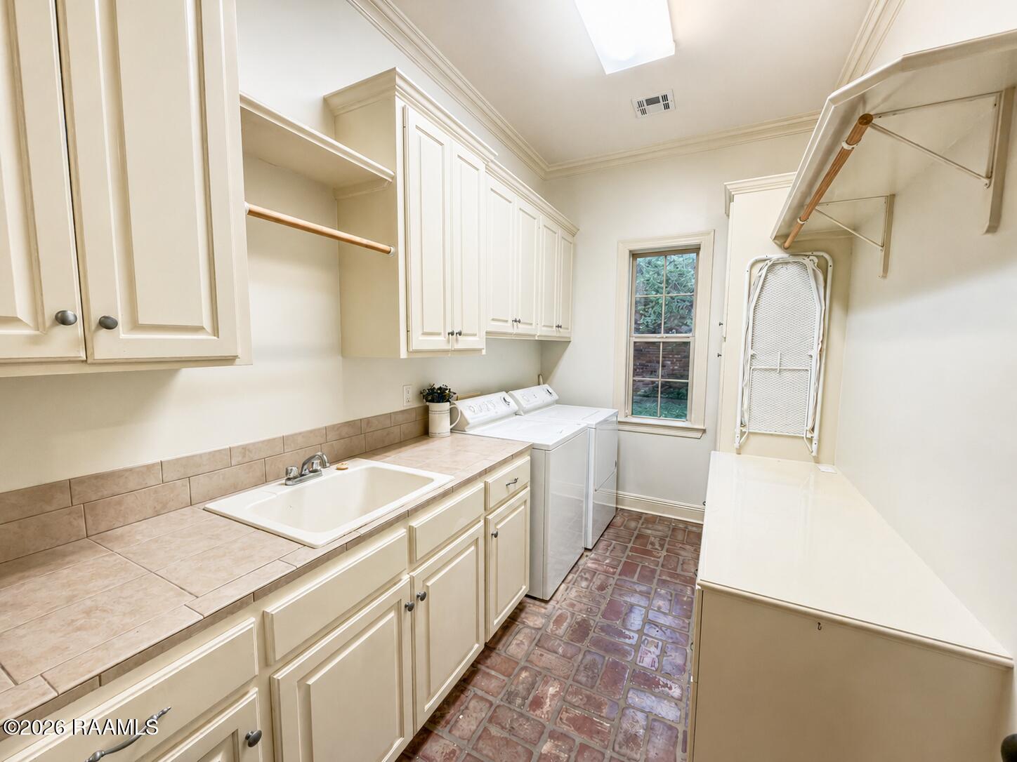 116 Isaiah Drive Lafayette, LA 70508 - Photo 14 of 40 116 Isaiah Laundry Room Updated
