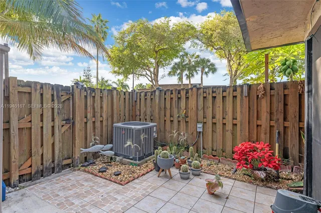 a garden view with a seating space