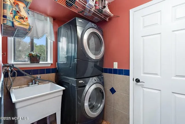 a utility room with dryer and washer