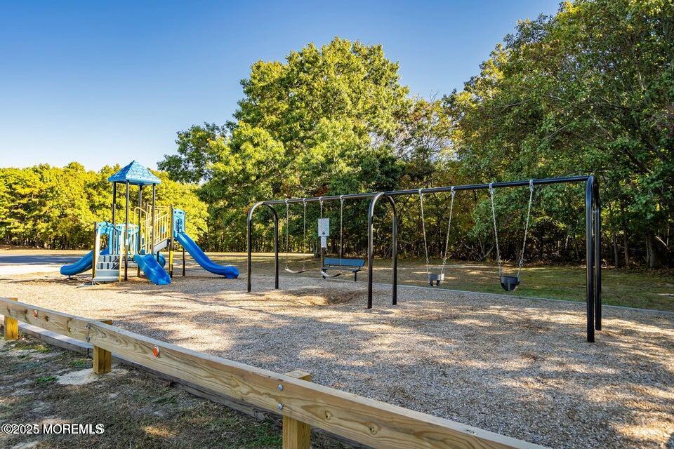 11 Desiree Court Howell, NJ 07731 - Photo 23 of 23 a view of a park with swings