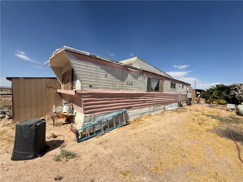 35030 Harvard Road Newberry Springs, CA 92365 - Photo 1 of 23 a view of a backyard of a house